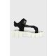 Sandali Love Moschino ženski, črna barva, JA16216G0GIX300A - črna. Sandali iz kolekcije Love Moschino. Model je izdelan iz kombinacije tekstilnega in sintetičnega materiala. Model z Velcro zapenjanjem omogoča individualno prileganje stopalu.