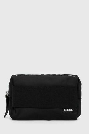 Kozmetična torbica Calvin Klein črna barva - črna. Kozmetična torbica iz kolekcije Calvin Klein. Model izdelan iz tekstilnega materiala.