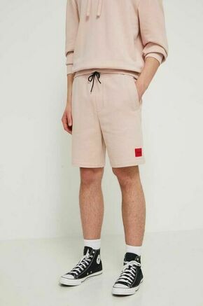 Bombažne kratke hlače HUGO roza barva - roza. Kratke hlače iz kolekcije HUGO. Model izdelan iz prožnega materiala
