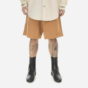 Bombažne kratke hlače New Balance oranžna barva - oranžna. Kratke hlače iz kolekcije New Balance. Model izdelan iz gladke pletenine. Model iz izjemno udobne bombažne tkanine.