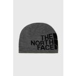 Obojestranska kapa The North Face siva barva - siva. Kapa iz kolekcije The North Face. Model izdelan iz pletenine s potiskom. Izdelek s posebnim dizajnom, ki omogoča dvostransko uporabo.
