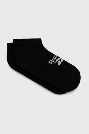 Nogavice Reebok črna barva - črna. Kratke nogavice iz kolekcije Reebok. Model izdelan iz elastičnega materiala s ploskimi šivi.