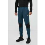 Hlače za vadbo adidas Performance Tiro 23 Competition Winterized - modra. Hlače za vadbo iz kolekcije adidas Performance. Model izdelan iz materiala, ki odvaja vlago.