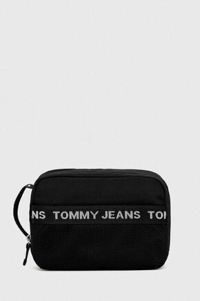 Kozmetična torbica Tommy Jeans črna barva - črna. Toaletna torbica iz kolekcije Tommy Jeans. Model izdelan iz tekstilnega materiala.