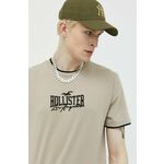 Bombažna kratka majica Hollister Co. bež barva - bež. Ohlapna kratka majica iz kolekcije Hollister Co. Model izdelan iz tanke, elastične pletenine. Izjemno mehek material.