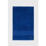 Brisača Lacoste 40 x 60 cm - modra. Brisača iz kolekcije Lacoste. Model izdelan iz tekstilnega materiala.