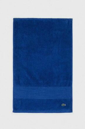 Brisača Lacoste 40 x 60 cm - modra. Brisača iz kolekcije Lacoste. Model izdelan iz tekstilnega materiala.