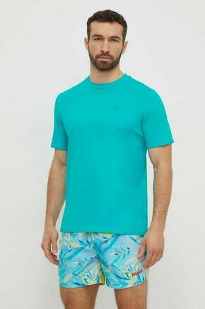 Bombažna kratka majica Guess turkizna barva - turkizna. Kratka majica iz kolekcije Guess. Model izdelan iz pletenine z nalepko.