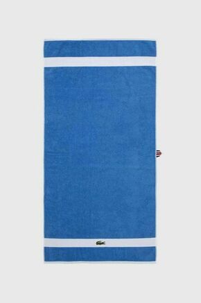 Brisača Lacoste L Casual Aérien 70 x 140 cm - modra. Brisača iz kolekcije Lacoste. Model izdelan iz bombažne tkanine.