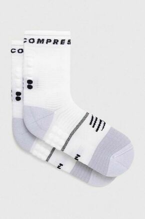 Nogavice Compressport Pro Marathon Socks V2.0 SMCU3780 - bela. Dolge nogavice iz kolekcije Compressport. Model izdelan iz materiala z antibakterijskim premazom.