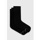 Nogavice Skechers (3-pack) ženske, črna barva - črna. Visoke nogavice iz kolekcije Skechers. Model izdelan iz elastičnega, enobarvnega materiala. V kompletu so trije pari.