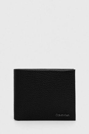 Usnjena denarnica in obesek za ključe Calvin Klein črna barva - črna. Srednje velika denarnica iz kolekcije Calvin Klein. Model izdelan iz naravnega usnja.
