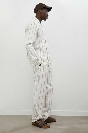 Bombažne hlače Les Deux bež barva - bež. Hlače iz kolekcije Les Deux. Model izdelan iz vzorčaste tkanine. Izjemno udoben material.