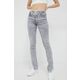 Kavbojke Calvin Klein Jeans ženski - siva. Kavbojke iz kolekcije Calvin Klein Jeans v stilu skinny s normalnim pasom. Model izdelan iz spranega denima. Prilagodljiv material, ki se prilagaja postavi.