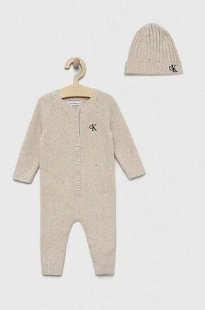 Pajac za dojenčka Calvin Klein Jeans - bež. Pajac za dojenčka iz kolekcije Calvin Klein Jeans. Model izdelan iz enobarvne pletenine. Modelu je priložena kapica.