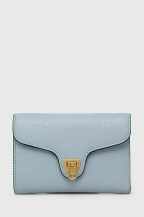 Usnjena denarnica Coccinelle ženski - modra. Srednje velika denarnica iz kolekcije Coccinelle. Model izdelan iz naravnega usnja.