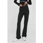 Hlače Calvin Klein Jeans ženski, črna barva - črna. Hlače iz kolekcije Calvin Klein Jeans. Model izdelan iz debele, rahlo elastične pletenine. Lahkoten elastičen material zagotavlja popolno svobodo gibanja.