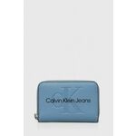 Denarnica Calvin Klein Jeans ženski, bela barva - modra. Mala denarnica iz kolekcije Calvin Klein Jeans. Model izdelan iz ekološkega usnja.