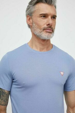 Kratka majica Guess moški - modra. Oprijeta kratka majica iz kolekcije Guess
