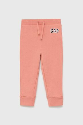 GAP otroške hlače - oranžna. Otroške hlače iz kolekcije GAP. Model narejen iz tanka