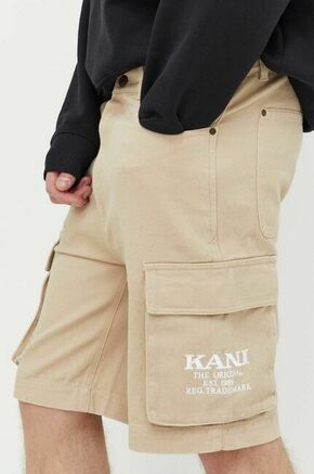 Bombažne kratke hlače Karl Kani bež barva - bež. Kratke hlače iz kolekcije Karl Kani. Model izdelan iz bombažne tkanine. Model iz togega materiala