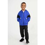 Otroška jakna Coccodrillo mornarsko modra barva - mornarsko modra. Otroški jakna iz kolekcije Coccodrillo. Prehoden model, izdelan iz vzorčastega materiala.
