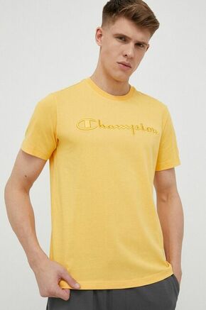 Bombažna kratka majica Champion oranžna barva - rumena. Kratka majica iz kolekcije Champion. Model izdelan iz pletenine z nalepko. Izjemno udoben material