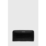 Denarnica Calvin Klein ženska, črna barva, K60K612356 - črna. Velika denarnica iz kolekcije Calvin Klein. Model izdelan iz ekološkega usnja.