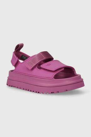 Otroški sandali UGG GOLDENGLOW vijolična barva - vijolična. Otroški sandali iz kolekcije UGG. Model je izdelan iz sintetičnega materiala. Model z mehkim