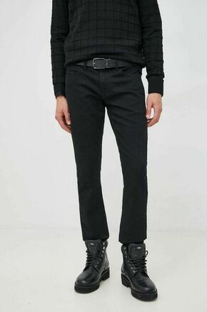 Kavbojke Calvin Klein moški - črna. Kavbojke iz kolekcije Calvin Klein v stilu slim s normalnim pasom. Model izdelan iz iz rahlo elastičnega denima.