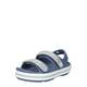 Otroški sandali Crocs CROCBAND CRUISER SANDAL - modra. Sandali iz kolekcije Crocs. Model je izdelan iz sintetičnega materiala. Idealno za bazen, plažo ali sprehode.