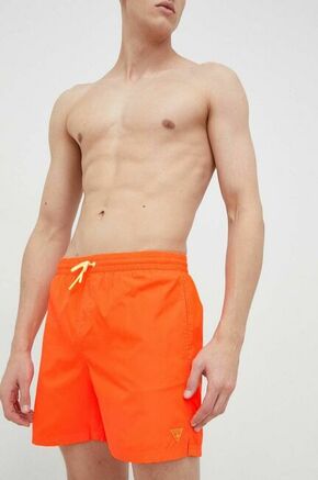 Kopalne kratke hlače Guess oranžna barva - oranžna. Kratke hlače za kopanje iz kolekcije Guess. Model izdelan iz hitrosušečega materiala.