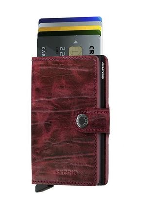 Secrid usnjena denarnica - rdeča. Srednje velika denarnica iz kolekcije Secrid. Model izdelan iz kombinacije naravnega usnja in kovine.