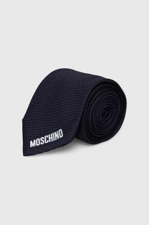 Svilena kravata Moschino mornarsko modra barva - mornarsko modra. Kravata iz kolekcije Moschino. Model izdelan iz enobarvne tkanine.
