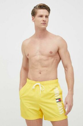 Kopalne kratke hlače Tommy Jeans rumena barva - rumena. Kopalne kratke hlače iz kolekcije Tommy Jeans. Model izdelan iz tkanine.