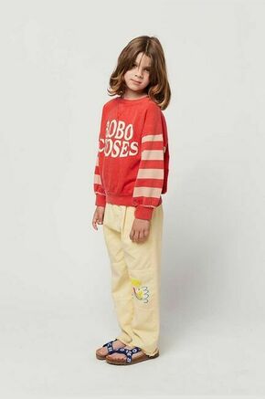Otroške bombažne hlače Bobo Choses rumena barva - rumena. Otroški hlače iz kolekcije Bobo Choses. Model izdelan iz tkanine s potiskom. Model iz izjemno udobne bombažne tkanine.