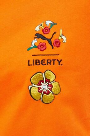 Bombažna kratka majica Puma X LIBERTY oranžna barva - oranžna. Ohlapna kratka majica iz kolekcije Puma
