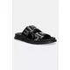 Natikači Steve Madden Agent ženski, črna barva, SM11003678 - črna. Natikači iz kolekcije Steve Madden. Model je izdelan iz ekološkega usnja. Model z gumijastim podplatom, ki je trpežen in odporen na poškodbe.