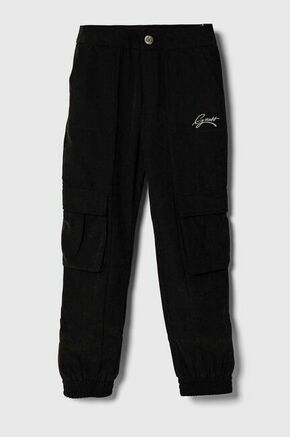 Otroške hlače Guess črna barva - črna. Otroški hlače iz kolekcije Guess. Model izdelan iz enobarvne tkanine. Zaradi vsebnosti poliestra je tkanina bolj odporna na gubanje.