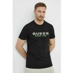 Kratka majica Guess moška, črna barva, M4GI61 J1314 - črna. Lahkotna kratka majica iz kolekcije Guess, izdelana iz pletenine, prijetne na otip. Model iz izjemno udobne tkanine z visoko vsebnostjo bombaža.