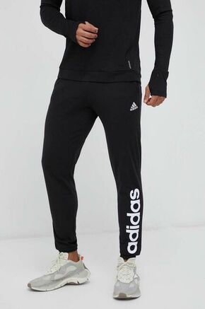 Hlače za vadbo adidas črna barva - črna. Hlače za vadbo iz kolekcije adidas. Model izdelan iz materiala