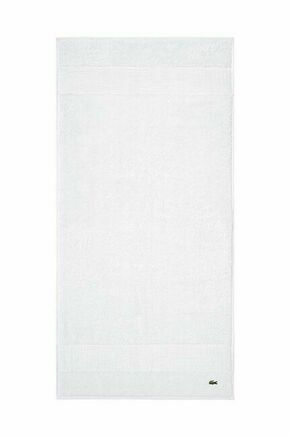 Bombažna brisača Lacoste 50 x 100 cm - bela. Bombažna brisača iz kolekcije Lacoste. Model izdelan iz tekstilnega materiala.