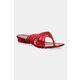 Japonke Melissa MELISSA FLIP FLOP DIESEL AD rdeča barva, M 36151 - rdeča. Japonke iz kolekcije Melissa. Model je izdelan iz sintetičnega materiala. Model z gumijastim podplatom, ki je trpežen in odporen na poškodbe.