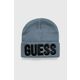 Otroška kapa Guess - modra. Otroški kapa iz kolekcije Guess. Model izdelan iz pletenine z nalepko.