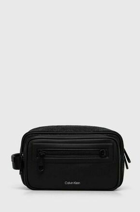 Kozmetična torbica Calvin Klein črna barva - črna. Toaletna torbica iz kolekcije Calvin Klein. Model izdelan iz kombinacije ekološkega usnja in tekstilnega materiala.
