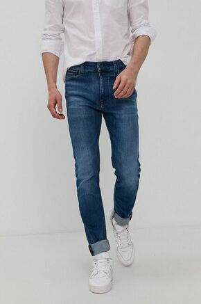 Kavbojke Tommy Jeans moško - modra. Kavbojke iz kolekcije Tommy Jeans v stilu skinny s redno pasom. Model izdelan iz elastičnega denima.