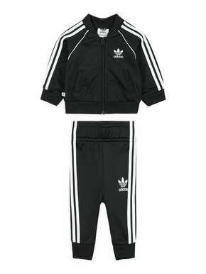 Adidas Originals otroška trenirka 62-104 cm - črna. Komplet trenirka za otroke iz kolekcije adidas Originals. Model izdelan iz pletenini.