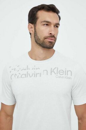 Kratka majica za vadbo Calvin Klein Performance bež barva - bež. Kratka majica za vadbo iz kolekcije Calvin Klein Performance. Model izdelan iz materiala