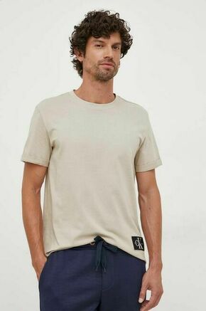 Bombažna kratka majica Calvin Klein Jeans bež barva - bež. Lahkotna kratka majica iz kolekcije Calvin Klein Jeans
