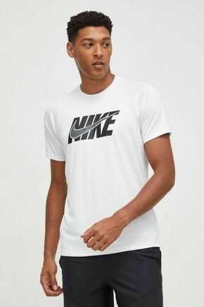 Kratka majica za vadbo Nike bela barva - bela. Kratka majica za vadbo iz kolekcije Nike. Model izdelan iz materiala